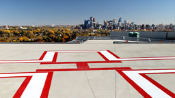 <strong>All about what you can't see...</strong></br>
                    This is the new helicopter pad on the roof of the Foothills Hospital. &nbsp; It is also the only shot where the client’s product is clearly visible, the self leveling compound which makes up the entire surface of the landing area.