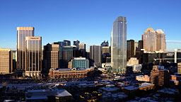 <strong>Calgary Cityscape</strong></br>
                    Once in a while a client requests a view of their project from further away. &nbsp; Architectural photography fits right here. &nbsp; Even though it might be cold outside, I always get a kick out of gaining rooftop access to one of the surrounding towers; it warms me up. &nbsp; The trick is to find an adjacent building, that is not too far, not too tall, and has easy access to the roof. &nbsp; From this vantage point I get to see the city grow, skyscraper by skyscraper.